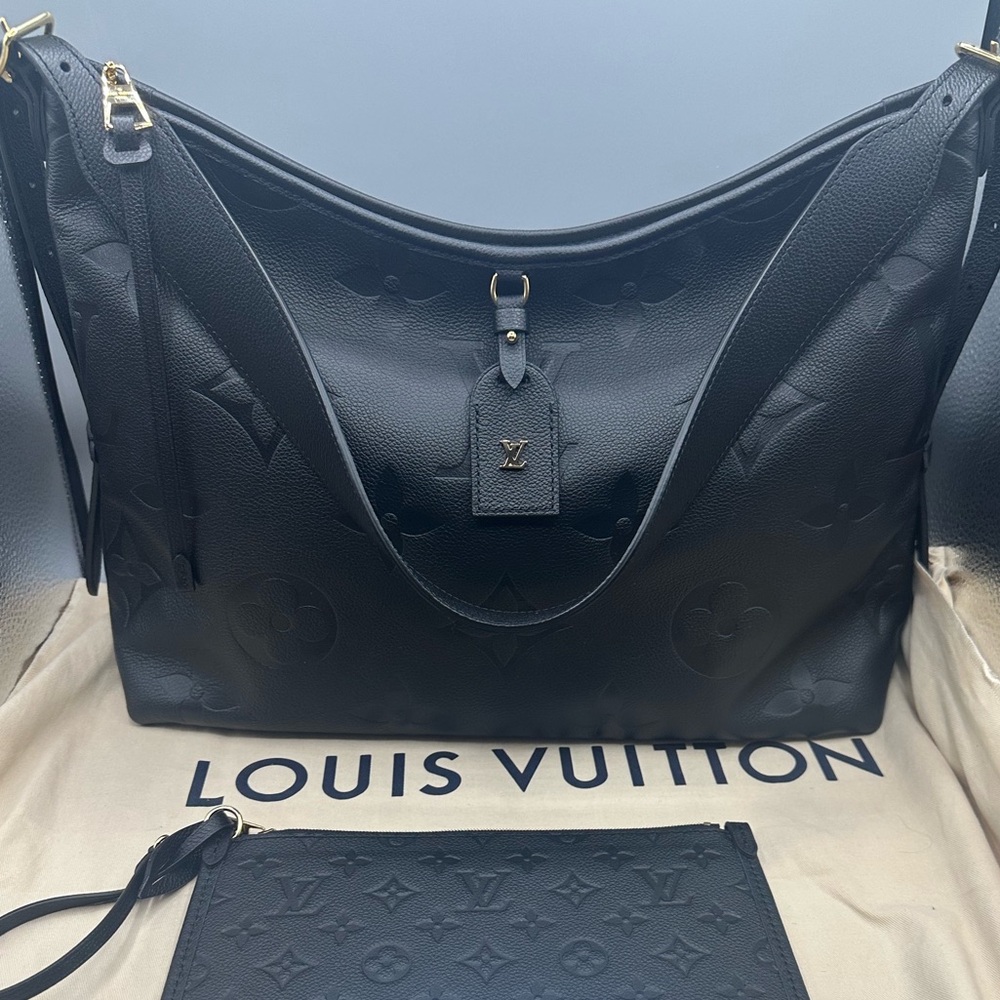 Louis Vuitton carry MM empriente - Picture 1 of 9